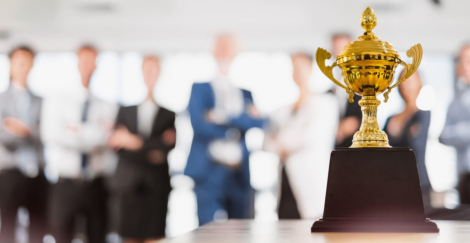 Group of Asian Business people celebrate for trophy, reward, winner, champion and teamwork successful concept